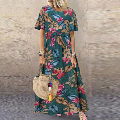 Lotte™ | Elegant Flowing Maxi Dress with Floral Charm