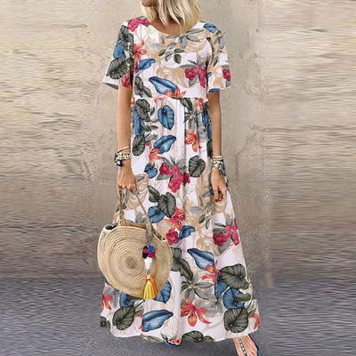 Lotte™ | Elegant Flowing Maxi Dress with Floral Charm